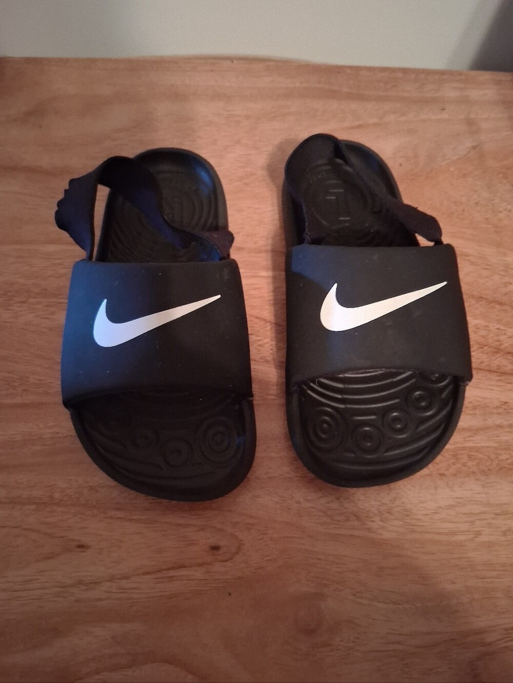 Nike Kids Black Sandals with White Swoosh